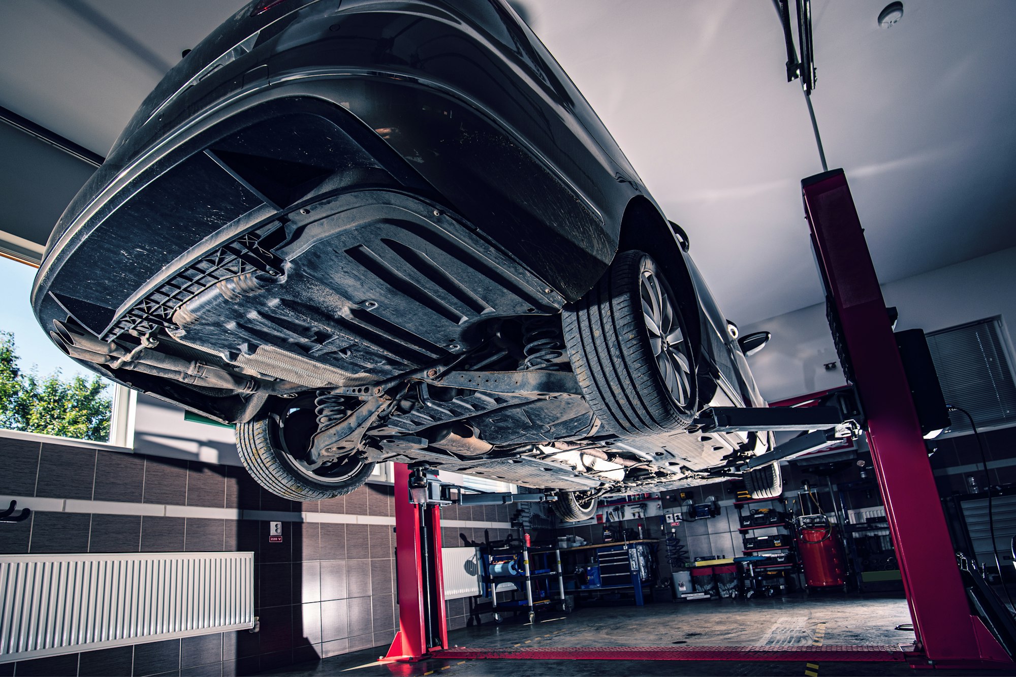 Lifted car in garage